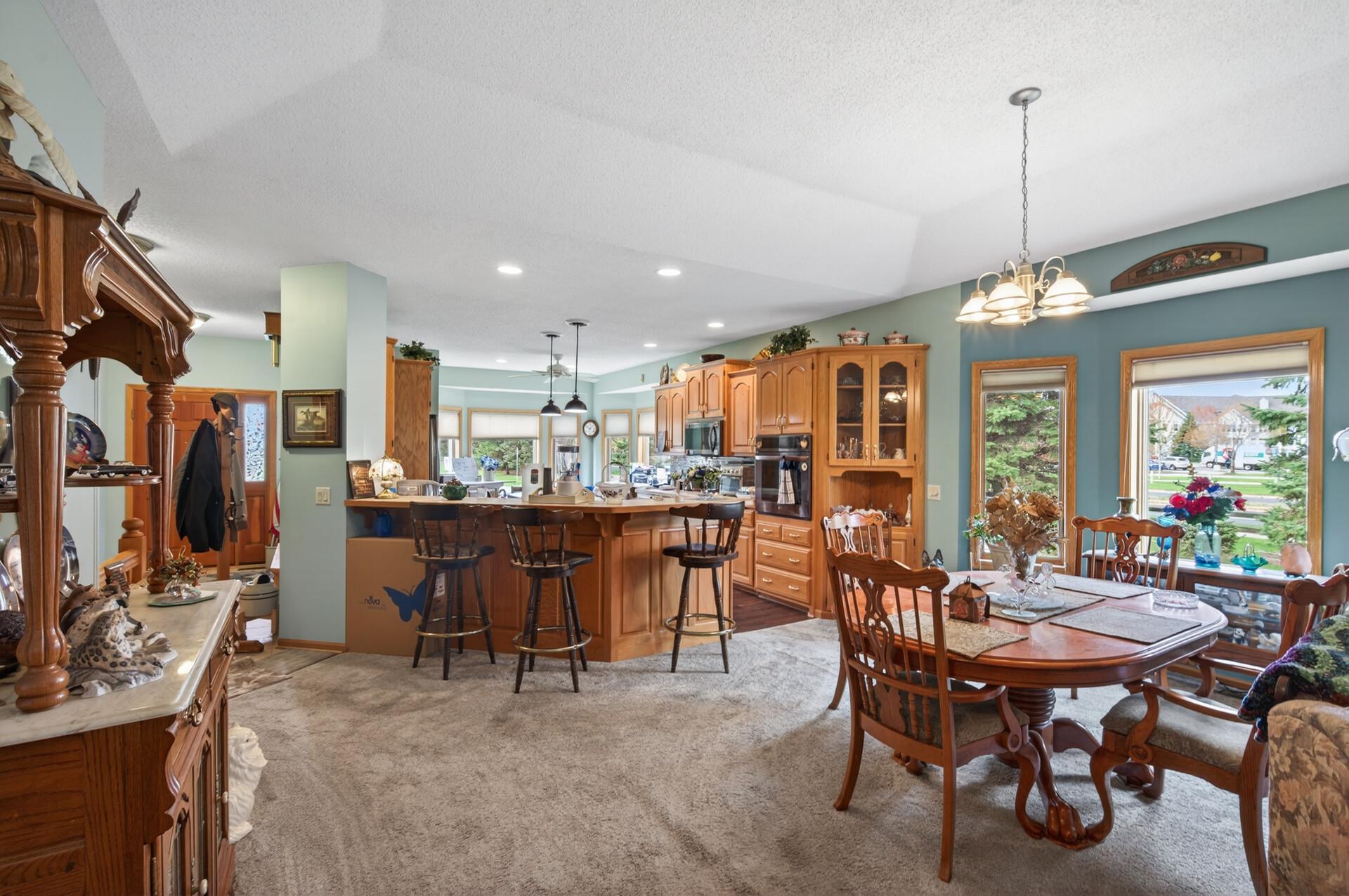 A breakfast bar provides extra casual seating or doubles as a convenient serving buffet.