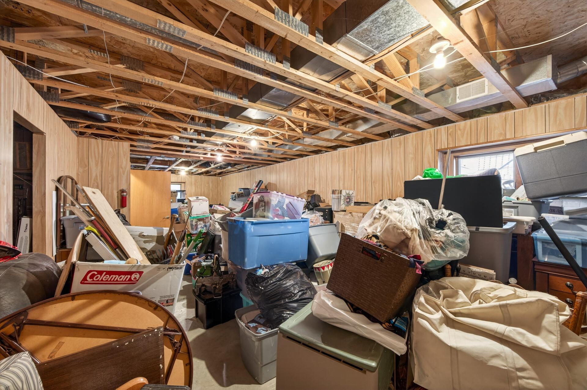 The unfinished lower level provides excellent storage or the opportunity to build equity with future finishing.