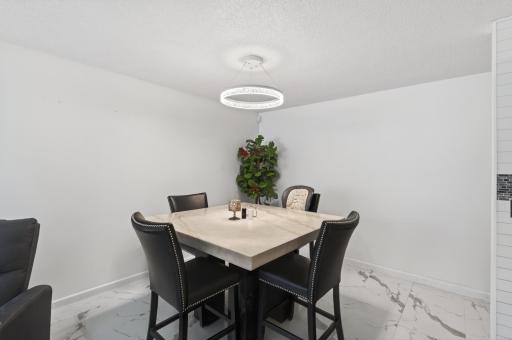 Updated, modern lighting adds a stylish touch while brightening the space beautifully.