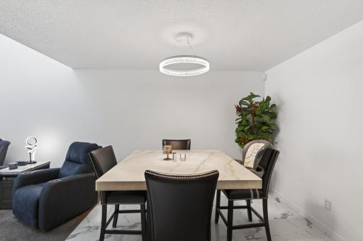 The informal dining area is perfect for formal meals.