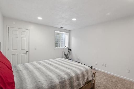 The lower level also features a third bedroom ideal for guests or older adults.