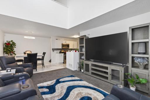 Enjoy a seamless flow into the informal dining area and modern kitchen.