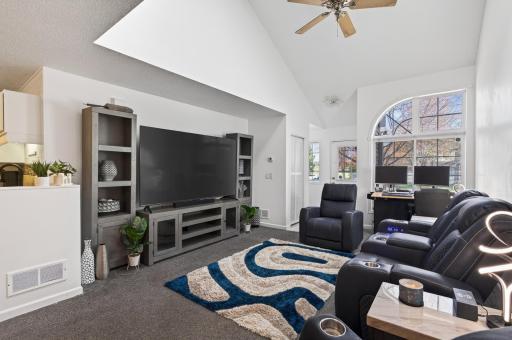 Abundant natural light streams through the large window.
