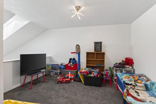 The loft overlooks the main level for an open feel.