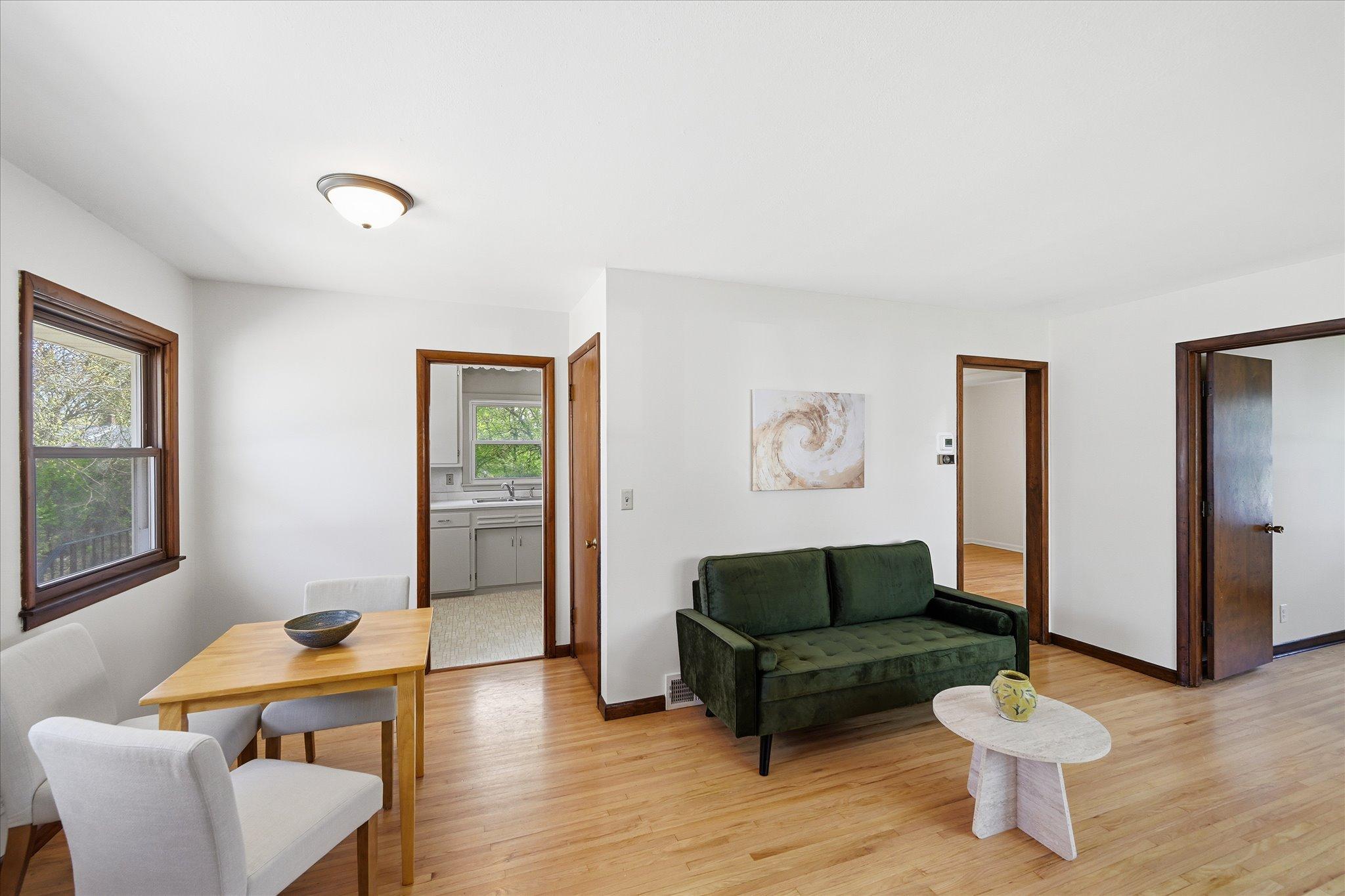 We love that the walk out lower level through the door on the right of Dining Room is easily accessibly hence inviting to the renovated lower level