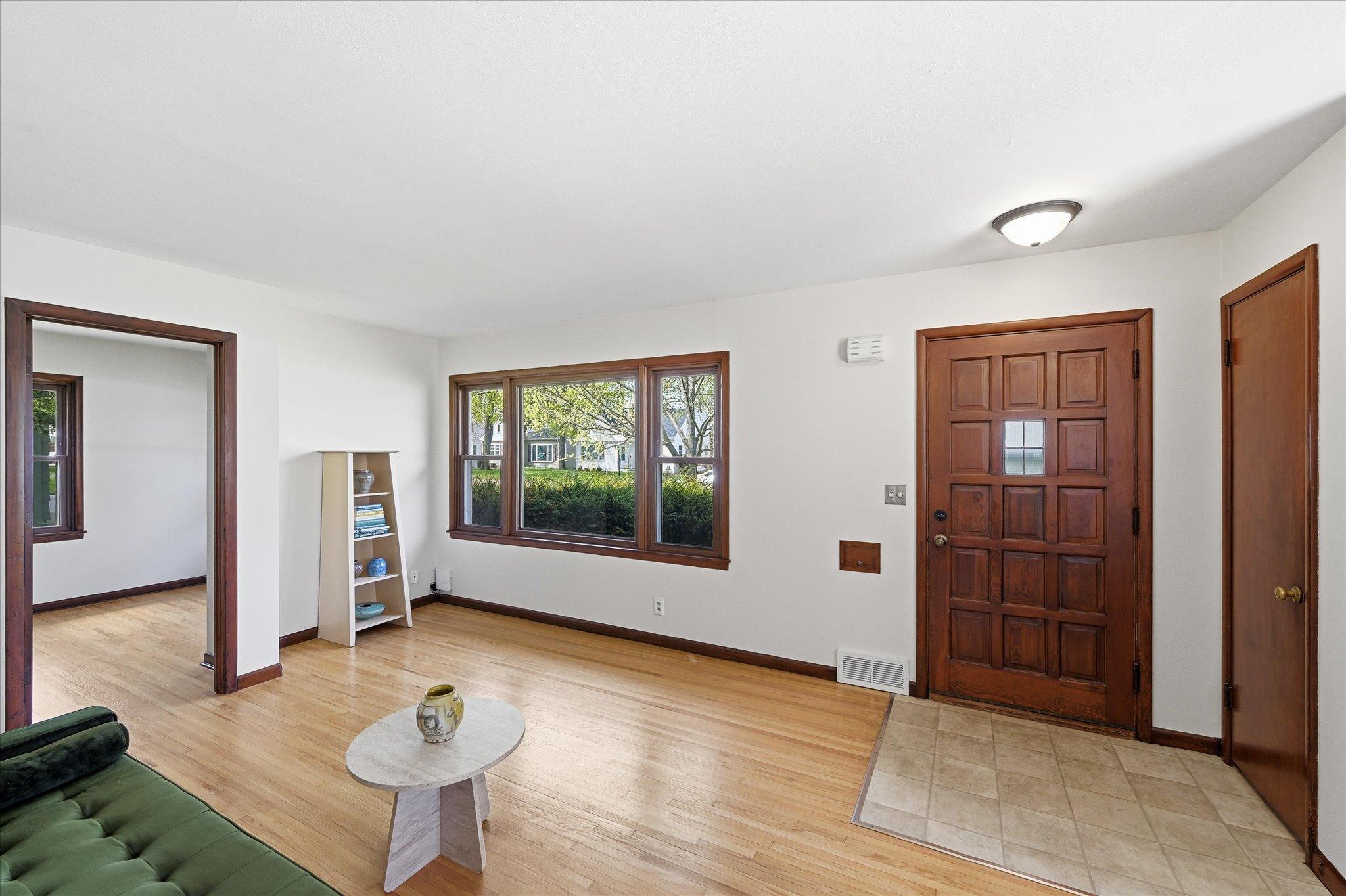 Welcome home to gleaming wood floors, newly paint interior, and exceptional views!