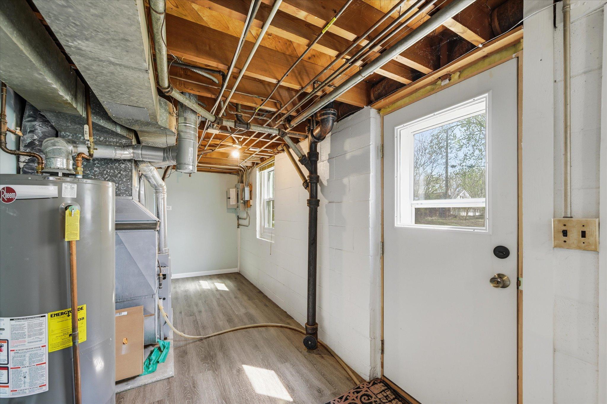 Plenty of storage and around corner there is a clean and lit under stair space that is HUGE!