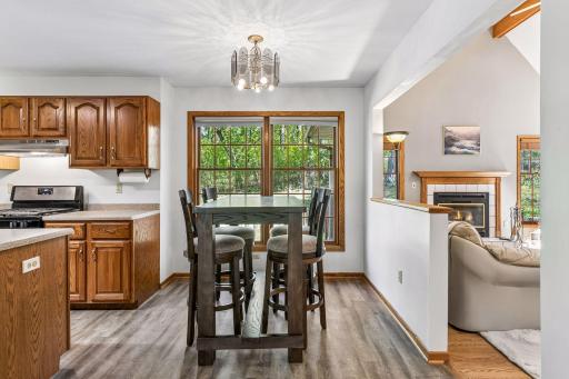 Informal dining area between living room and kitchen