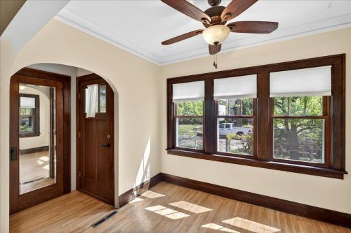 The woodwork throughout this home is stunning. The sunroom on the front of the home is loaded with natural light!