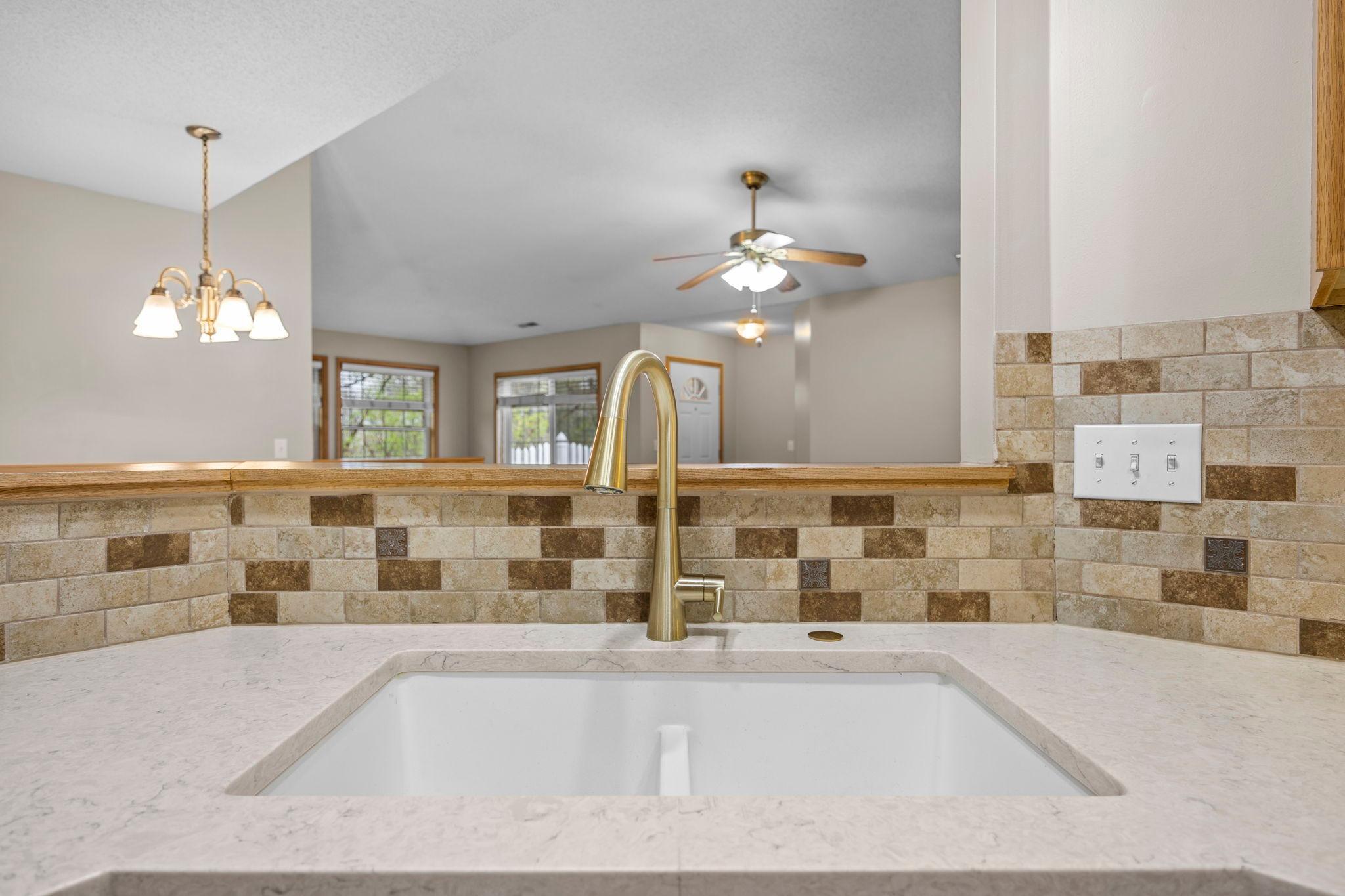 The backsplash looks so nice with the new countertops.