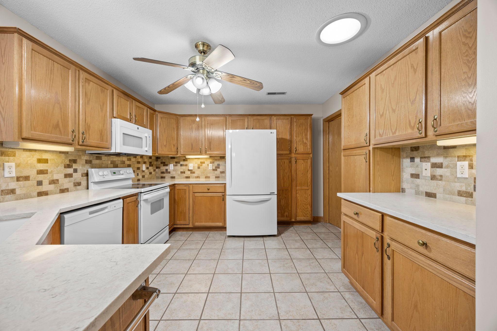 The kitchen has an abundance of cabinetry! You will have plenty of space for the stuff you don't use very often. :-)