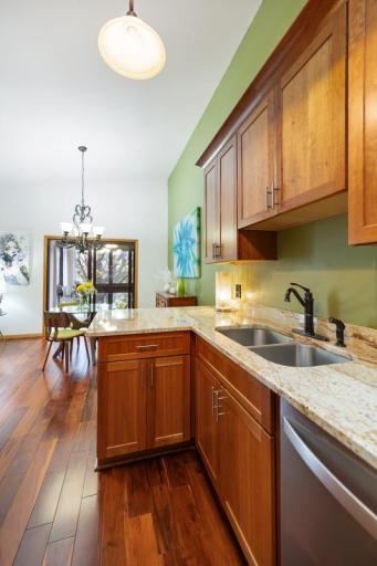 Cherry cabinets, granite countertops and stainless steel appliances come together in a way that is equal parts stunning and functional.