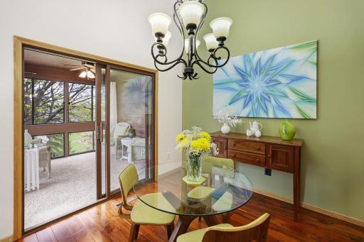 Nestled between the kitchen and the sun room, the dining room occupies one of the best spots in the home.