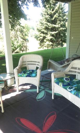 Sun-drenched and surrounded by green â this patio is hard to leave.