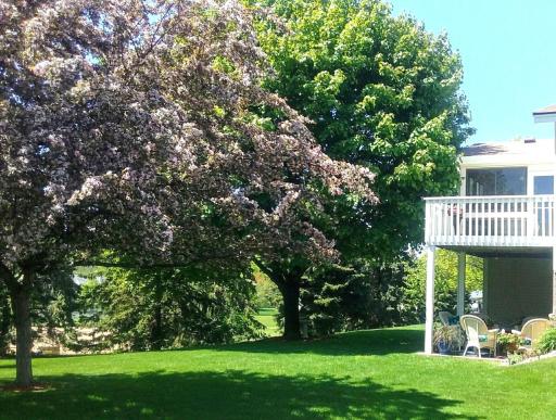 Mature trees, blooming florals, and thoughtful plantings that look beautiful every season.