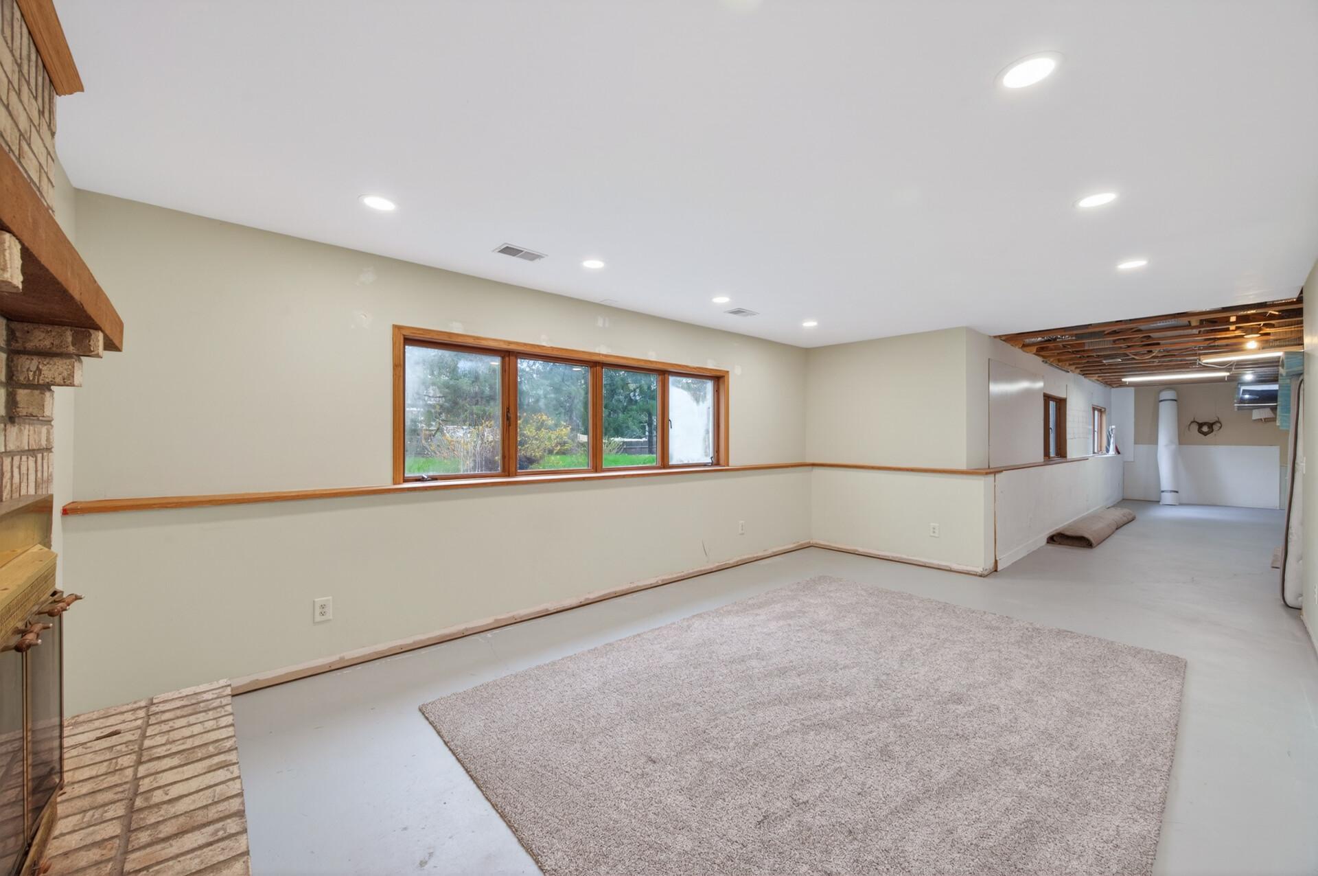 Large rec room, home office, workout space or additional family room-the possibilities are endless!
