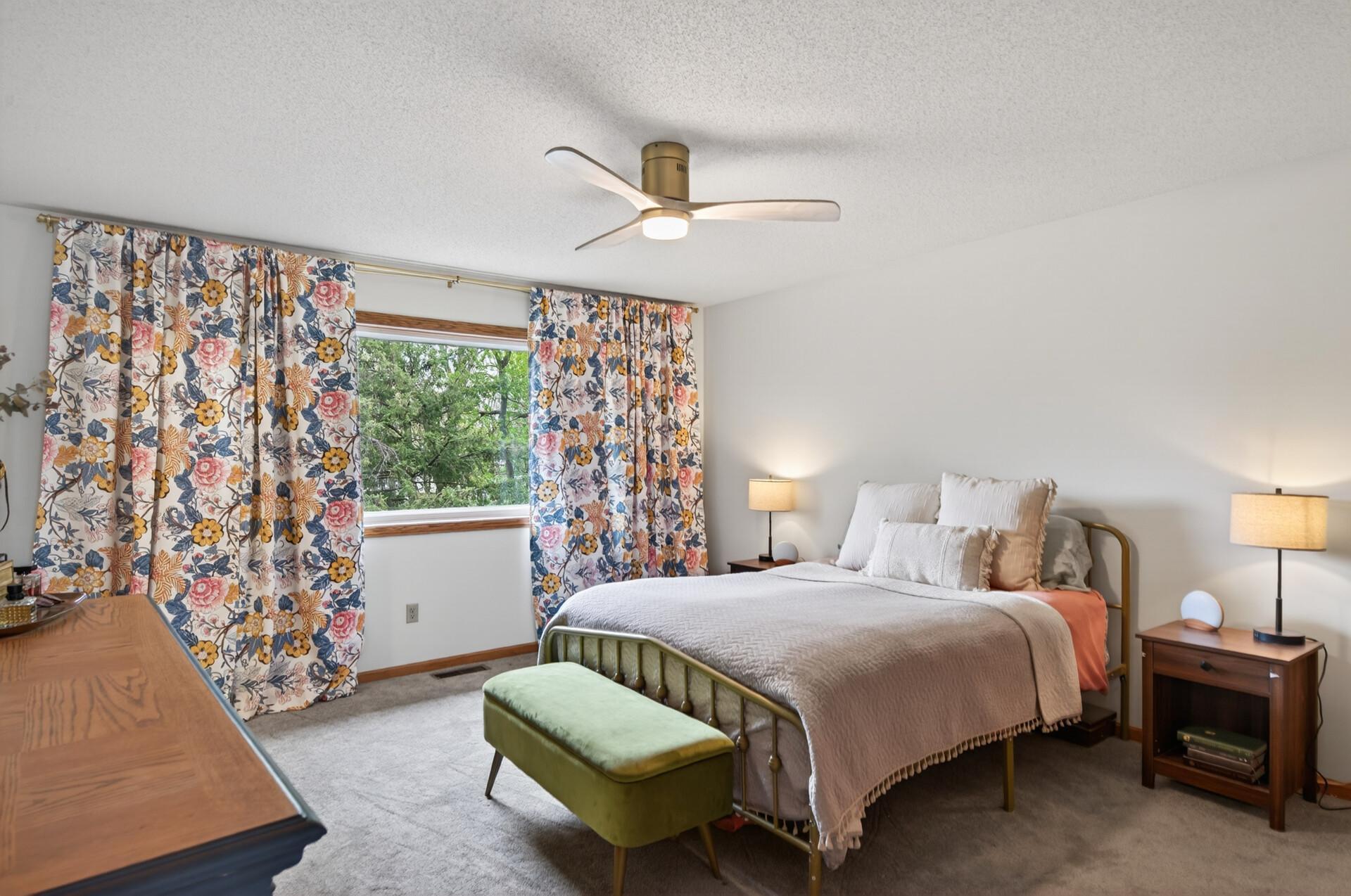 Retreat to your primary suite with ensuite bath, and two closets each with closet systems.