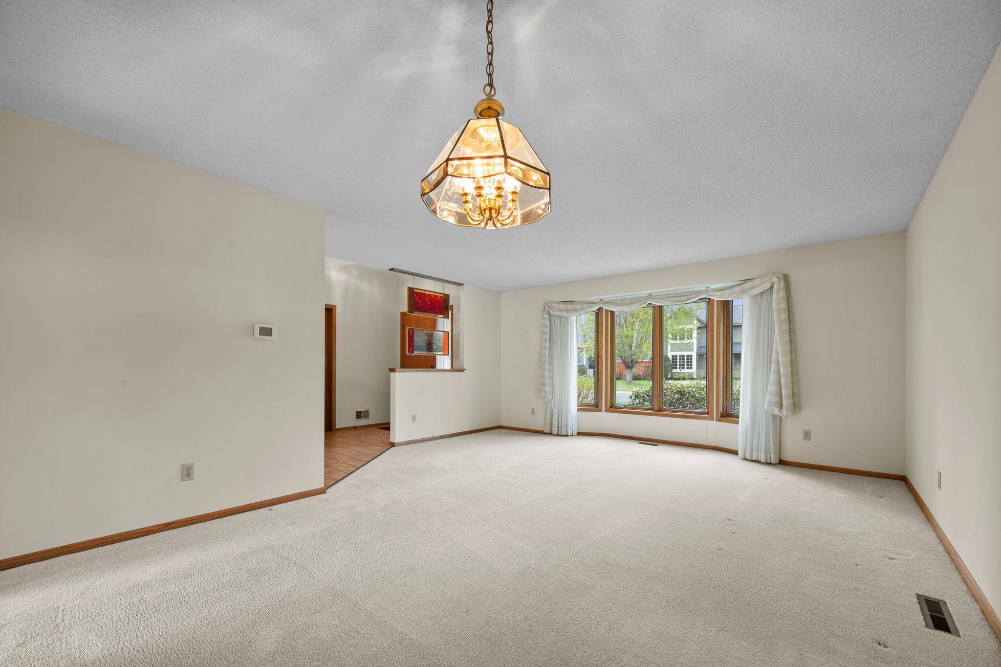 The beautiful bay window offers plenty of natural sun light in and beautiful views of the front yard