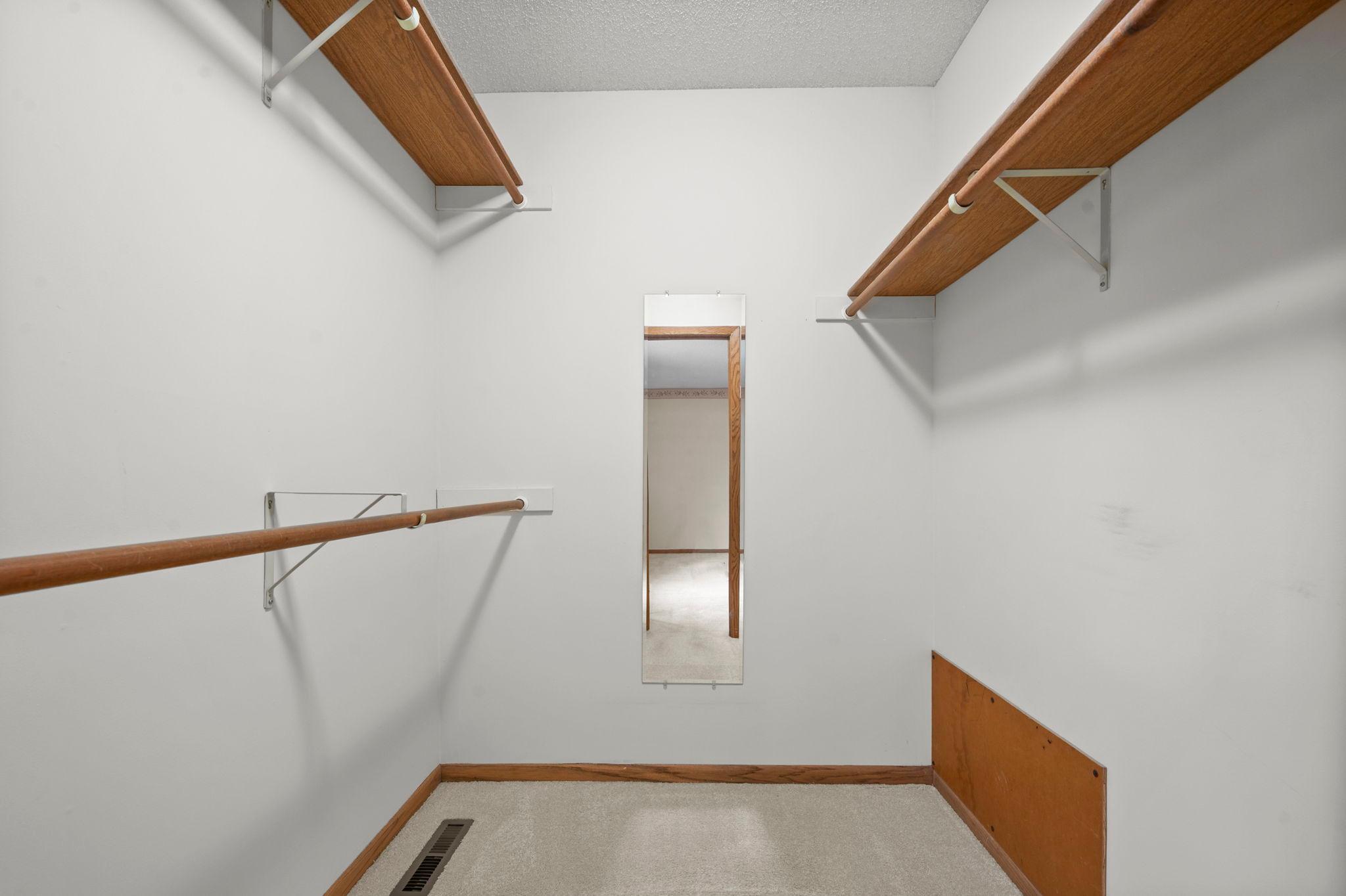 Large walk in closet in primary bedroom