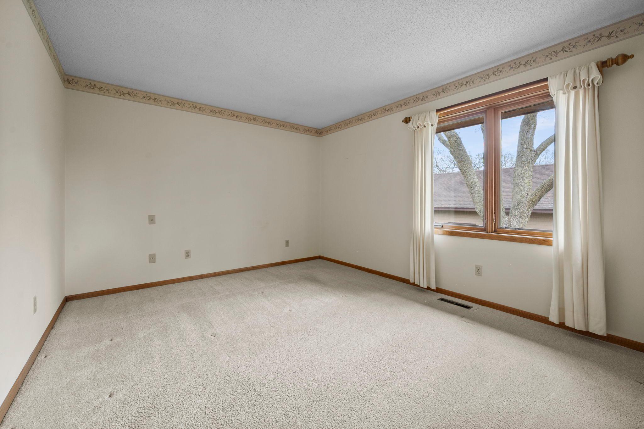 The primary bedroom located on the upper level