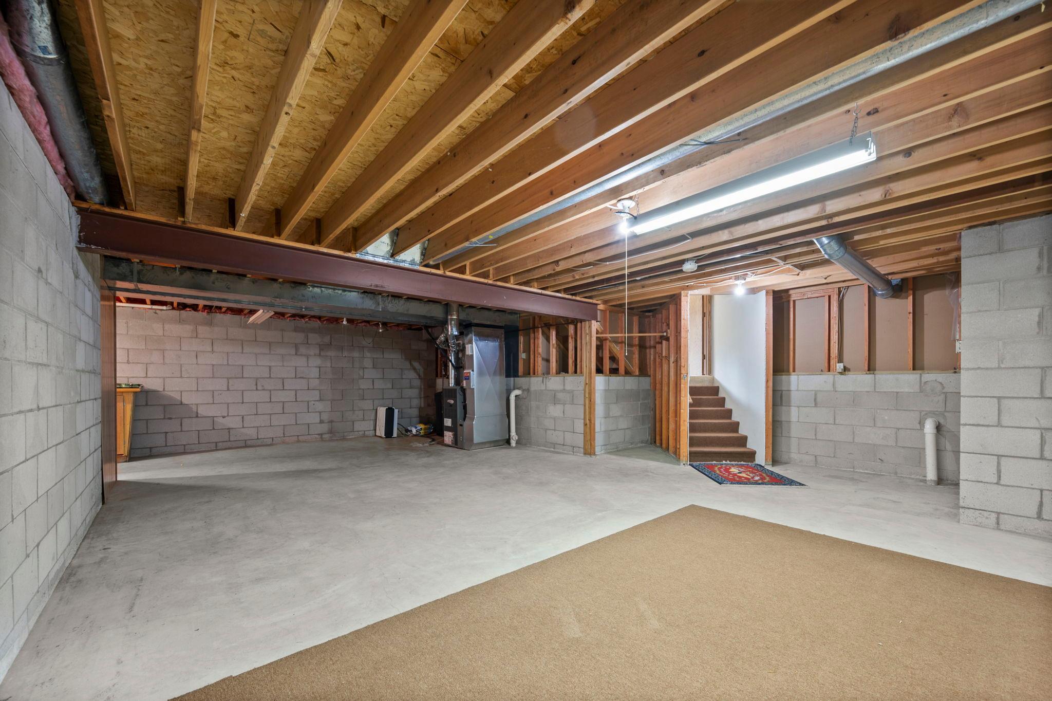 The unfinished fourth level has an abundant amount of space for additional storage or to finish off for additional equity