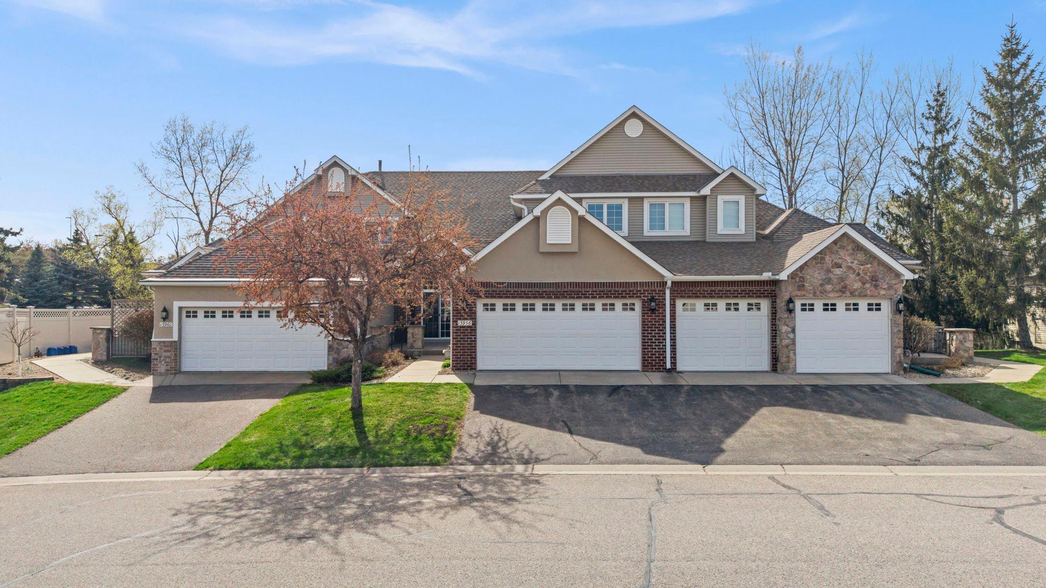 Former model, Luxury Townhome offering downsizing living with extra space for loved ones! Spacious townhome, towering vaulted ceilings, finished walkout basement all makes this one stand out!