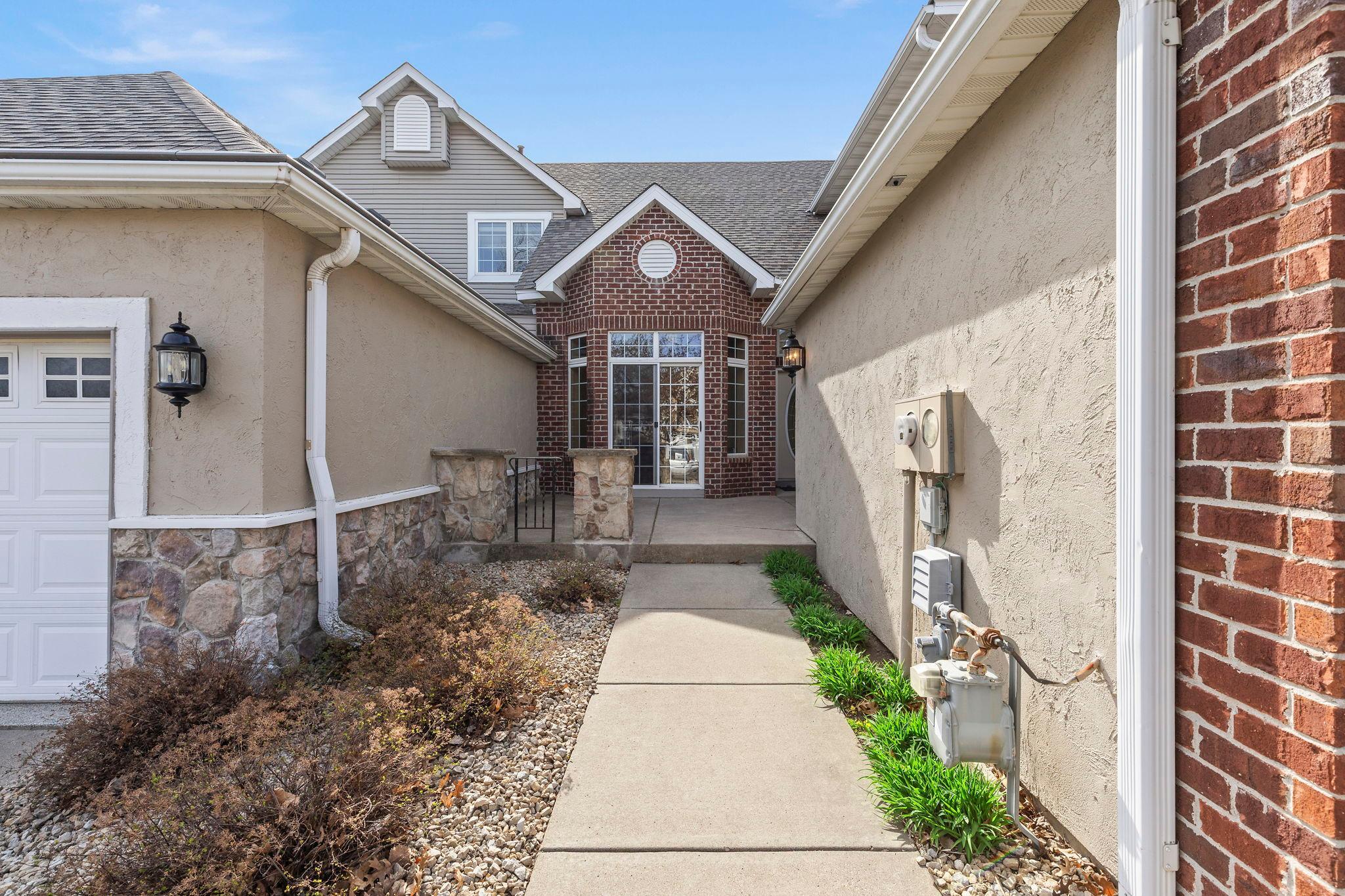 Designed to impressed. Brick, large windows and front walkout from kitchen to patio retreat.