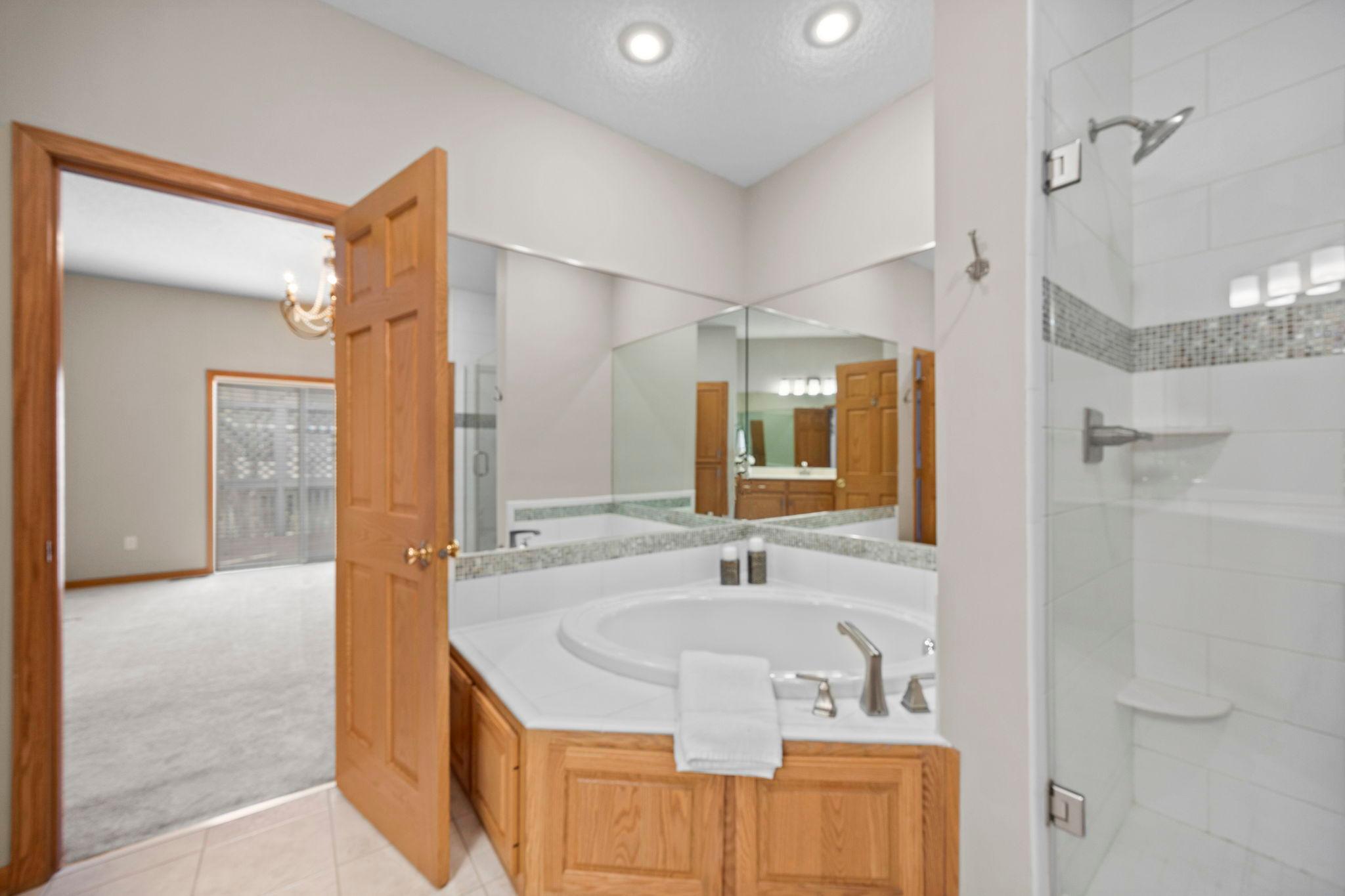 Relaxing after a busy day in a luxury, jacuzzi tub.