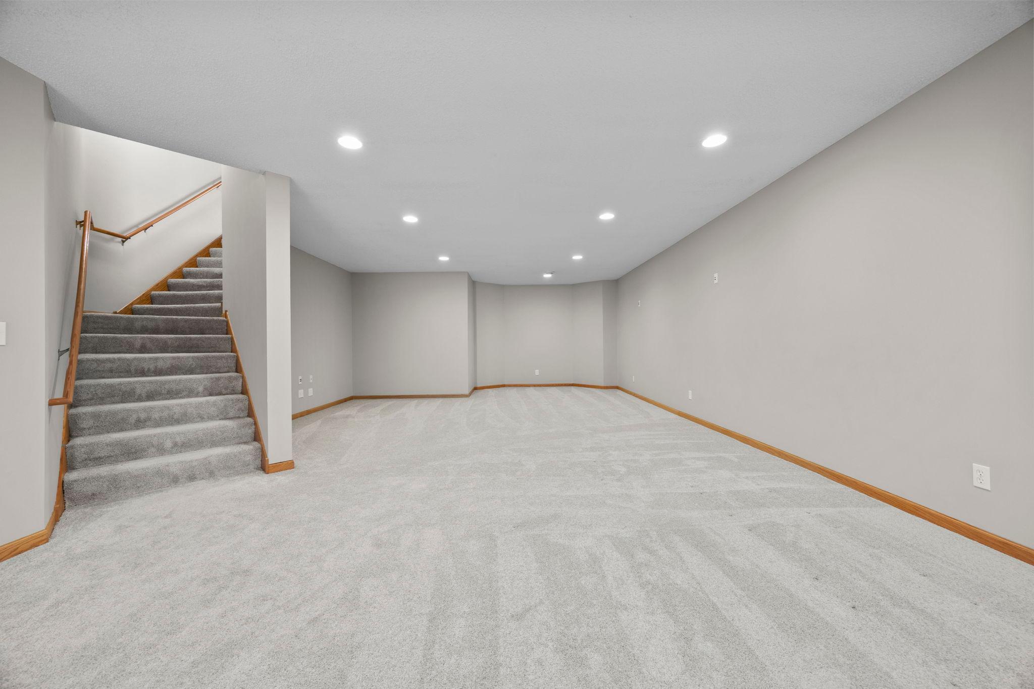 Fully finished basement with neutral carpeting and paint making this move in ready!
