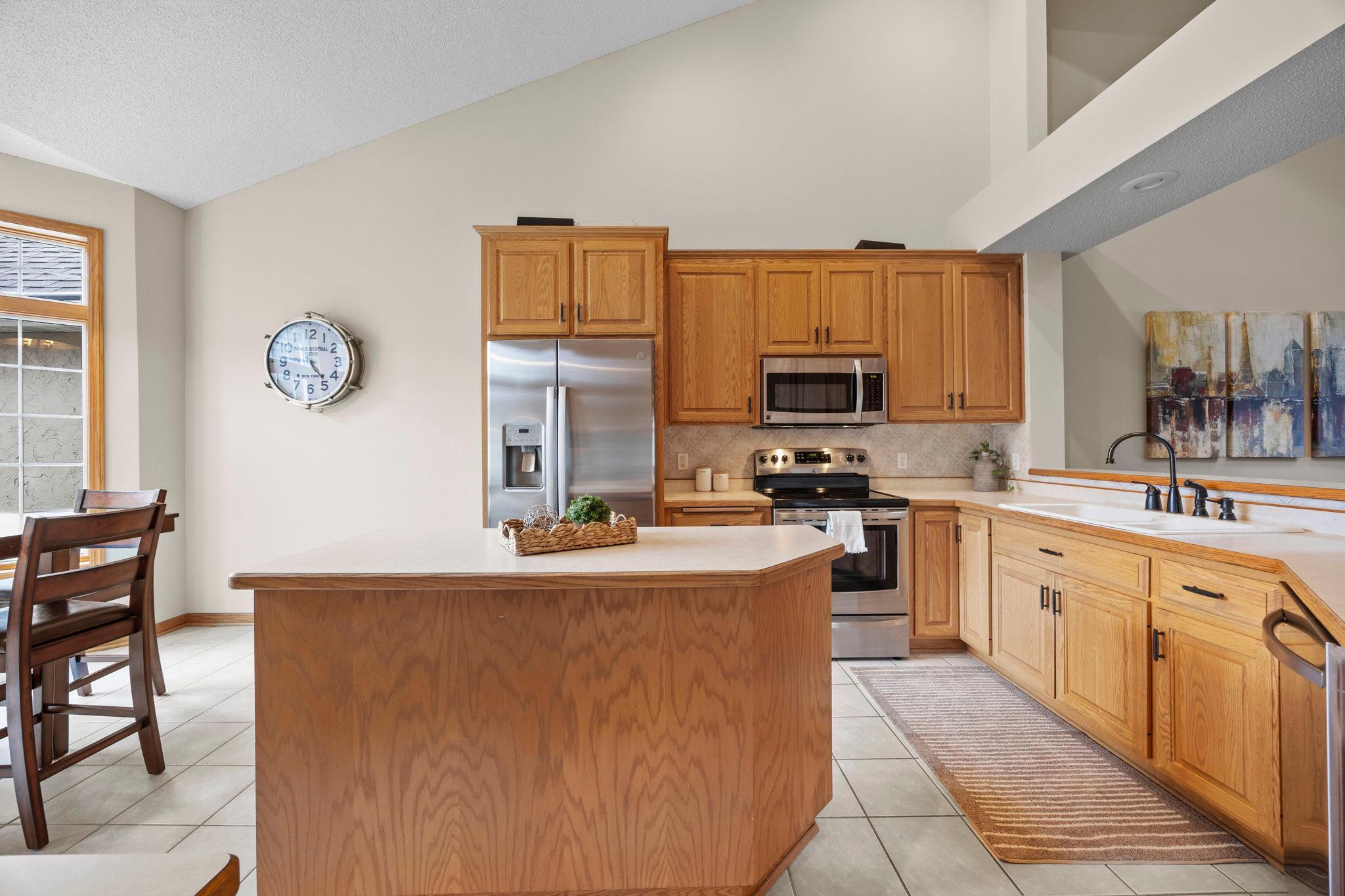 Amazing kitchen space with center island and a ton of cabinetry.
