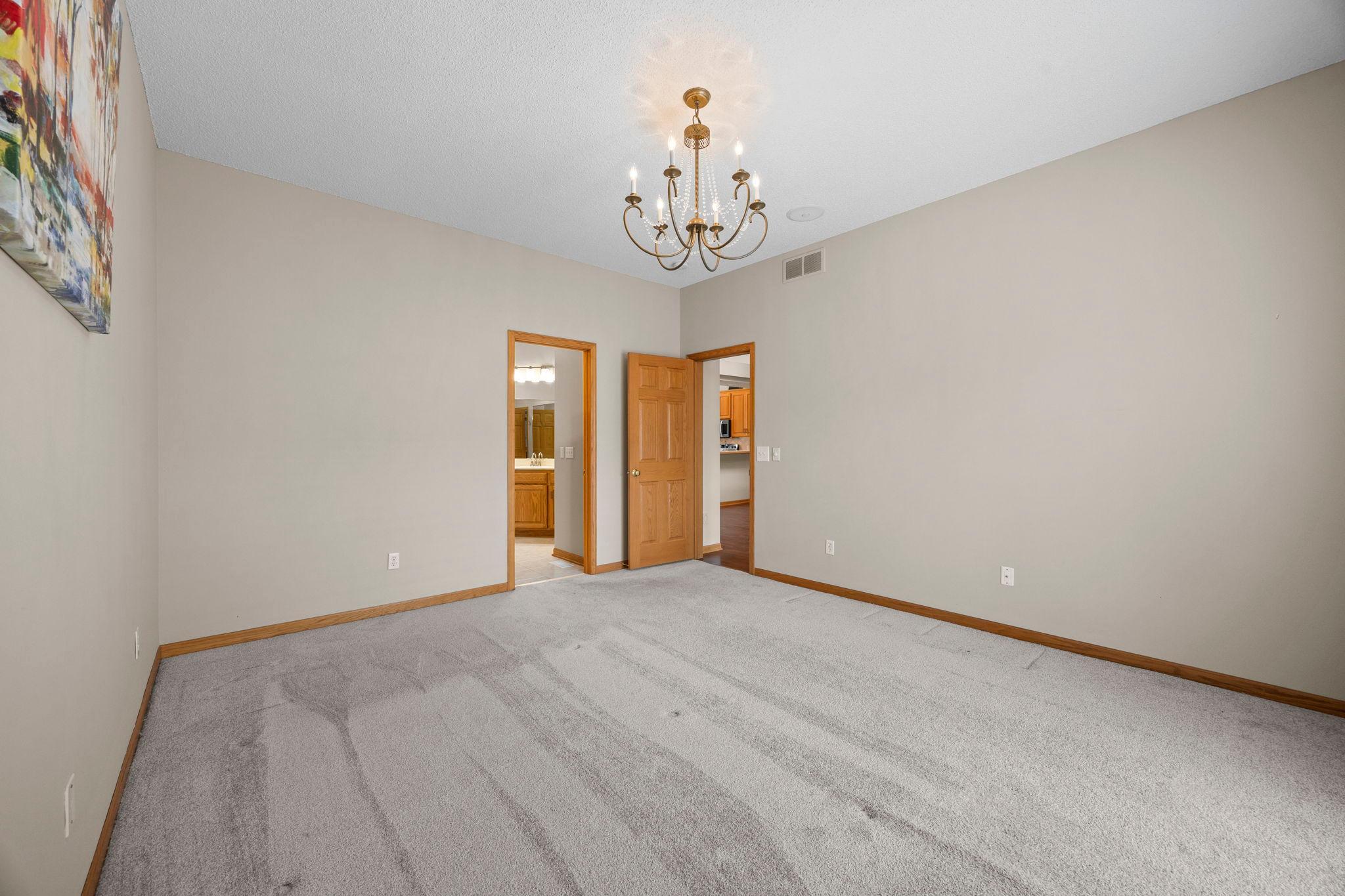 Primary offers luxury bathroom and walk-in closet.
