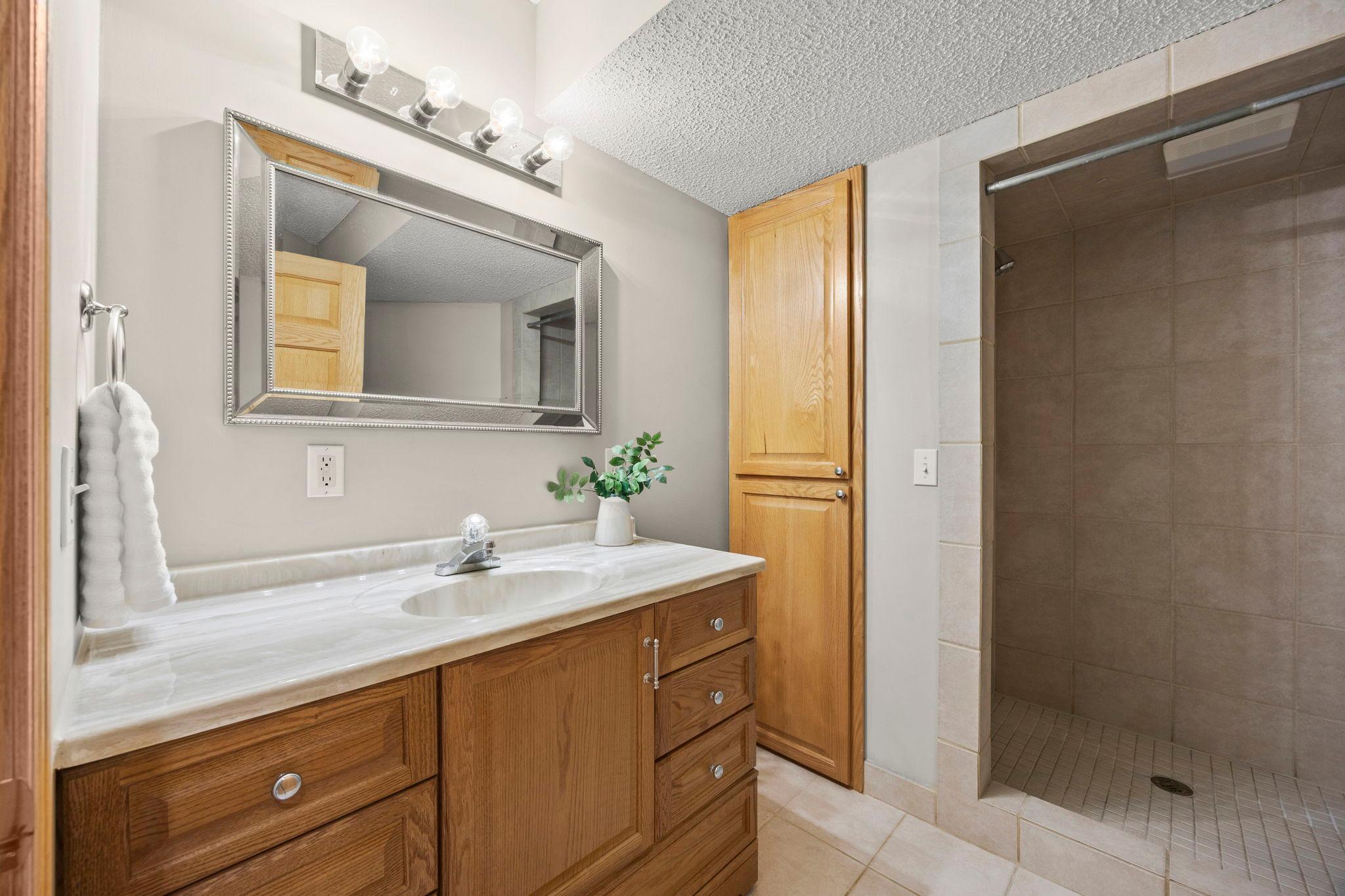 3/4 bathroom in the lower level with walk-in shower.