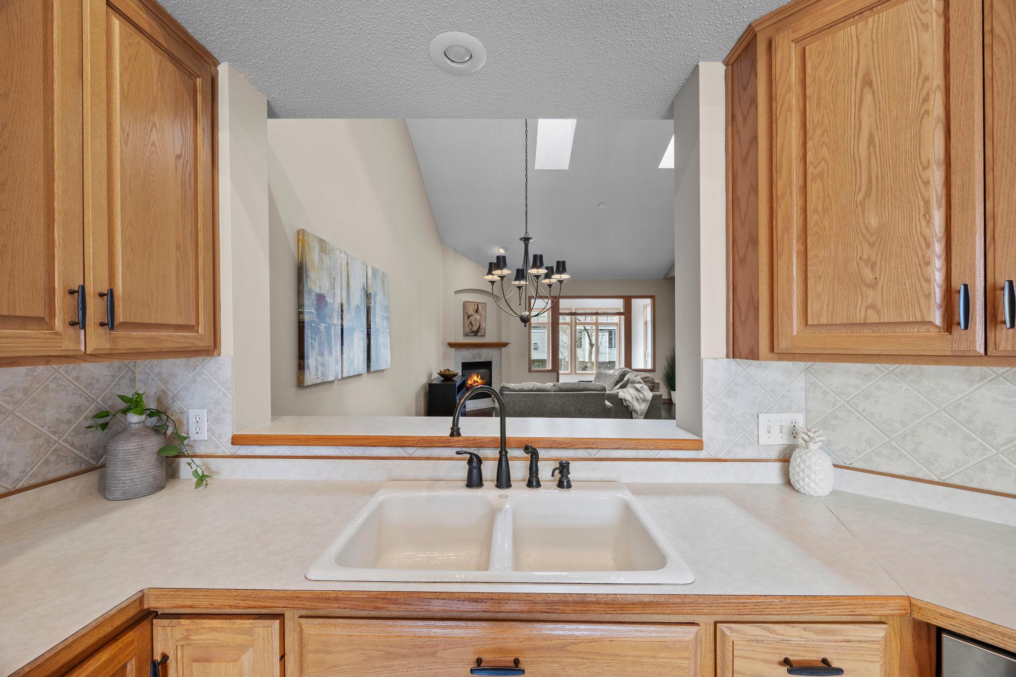 Seamless open floor plan between kitchen, dining and living room.
