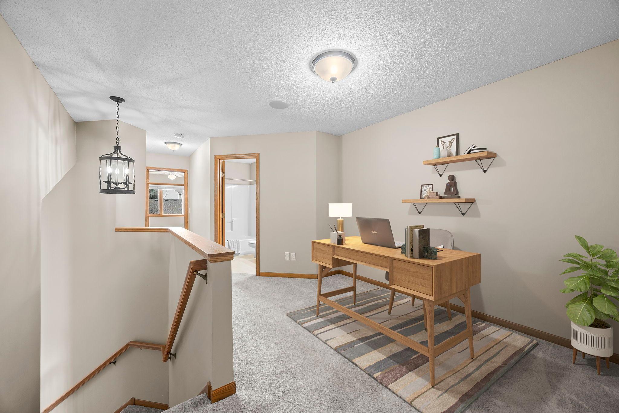 Loft offers a fabulous flex space for office or reading nook.