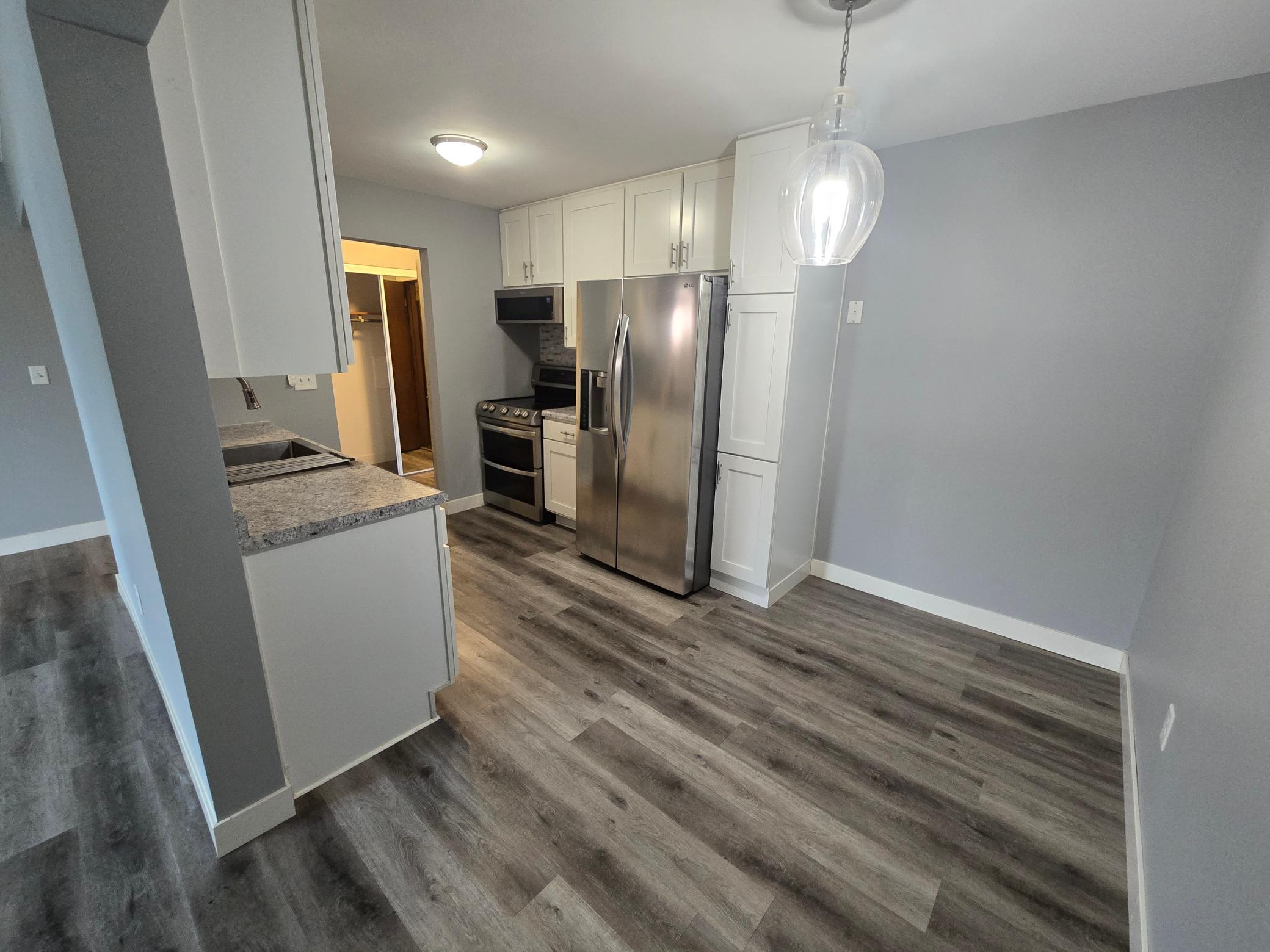 Kitchen view 4 and dining area.