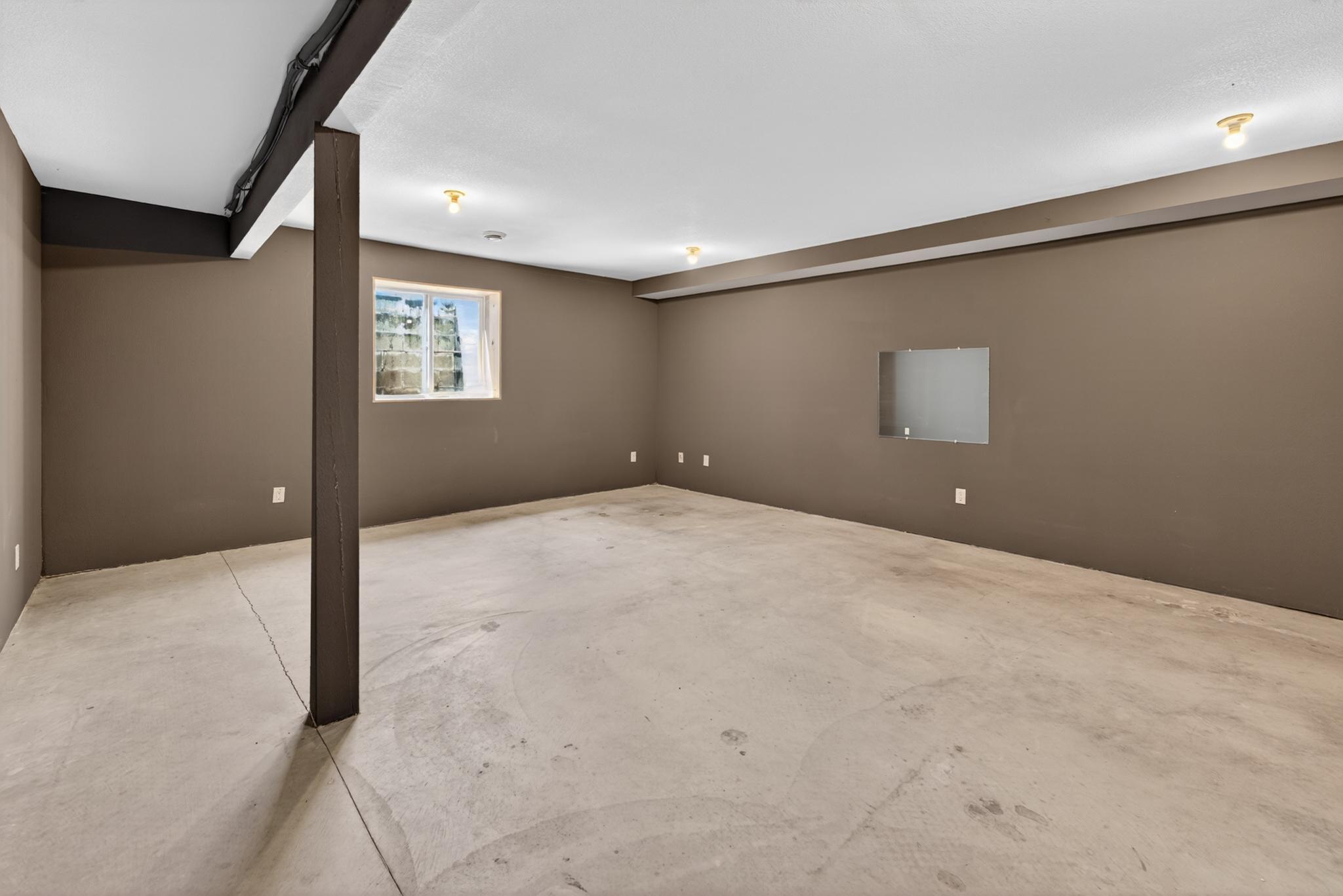 Basement in the lowest level features a large room "bonus room"