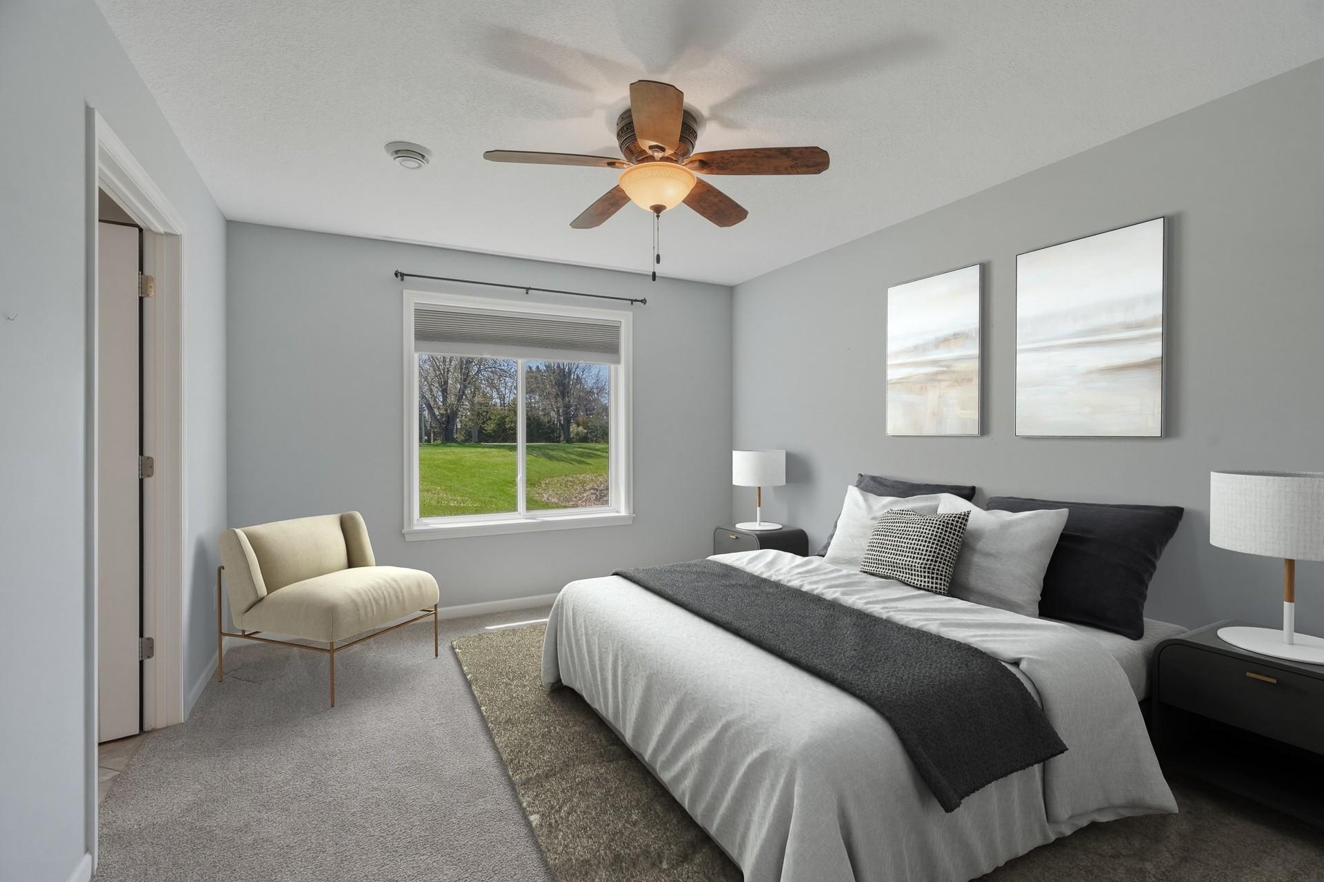 Virtually staged photo of the primary bedroom.