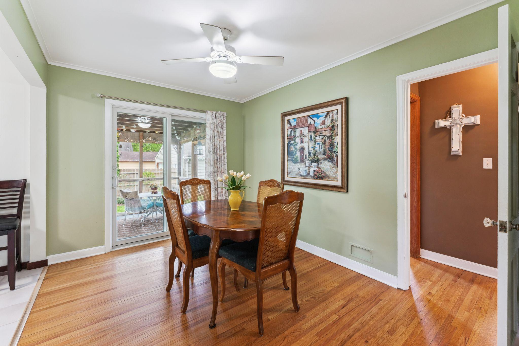 Formal dining room with walkout to 3-season porch