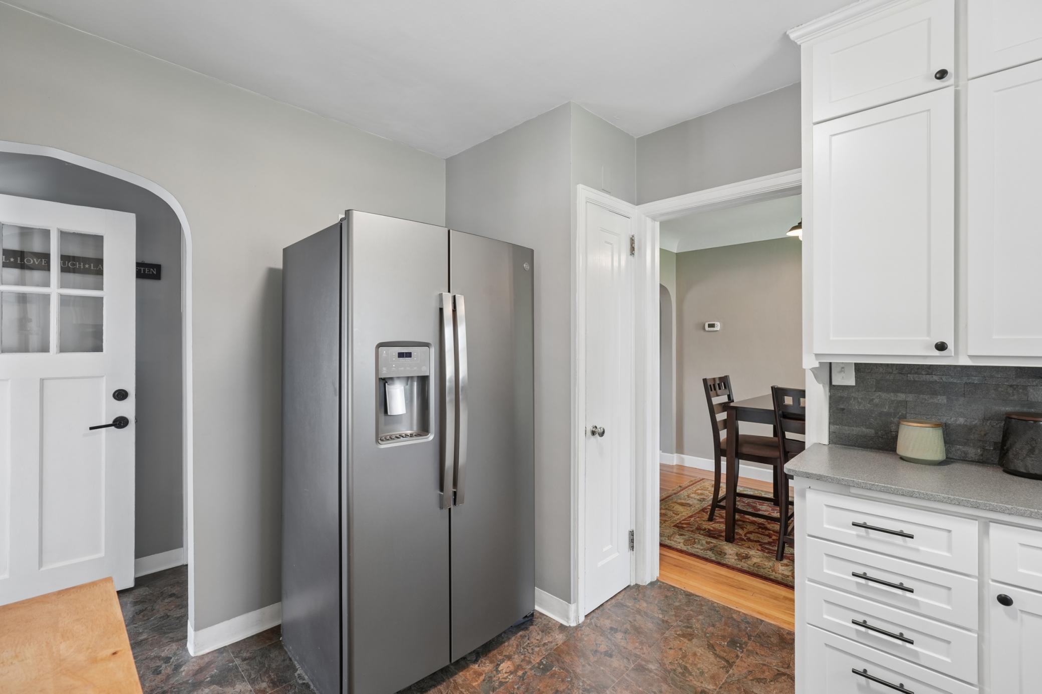 Kitchen featuring stainless-steel appliances and a pantry.