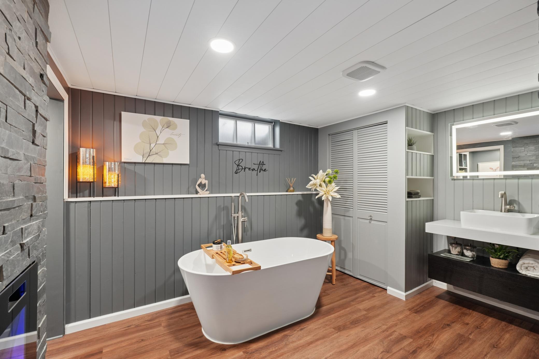 The remodeled lower level bathroom with a soaking tub.