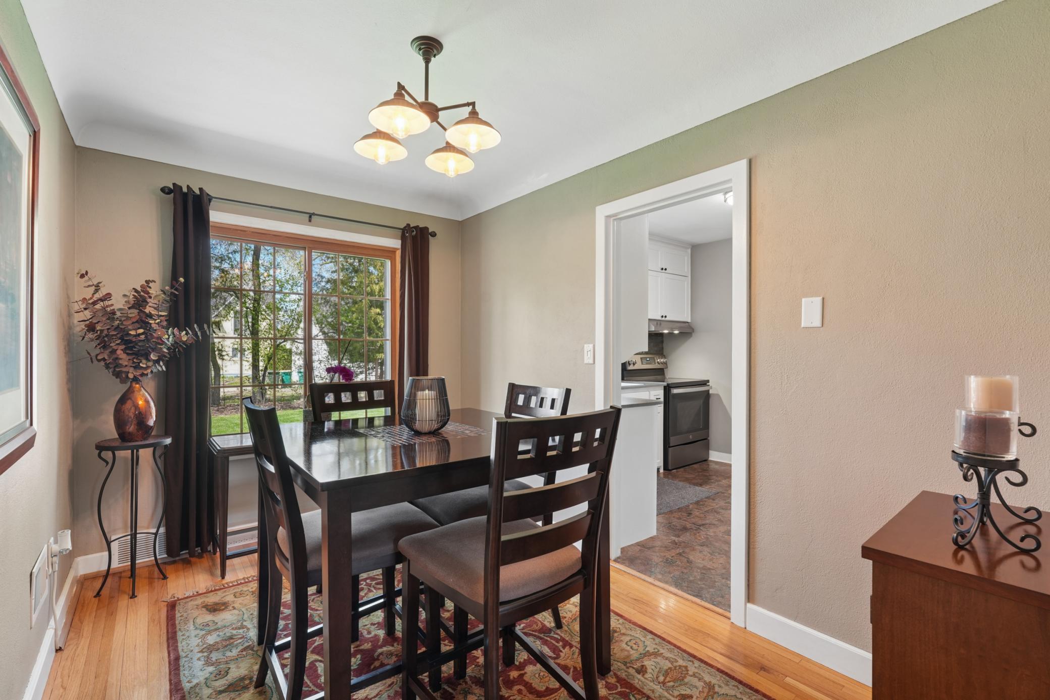 Dining room with hardwood floors.