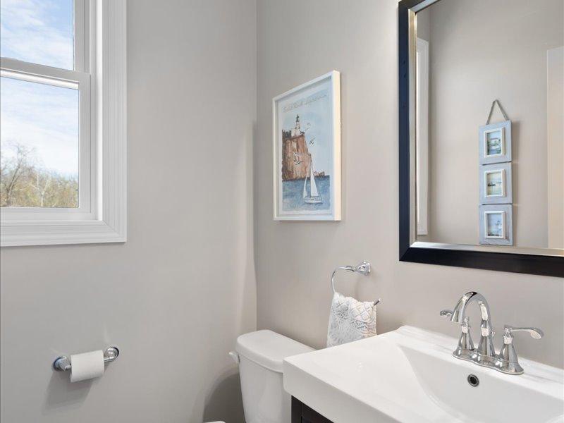 1/2 bath on main level in from garage