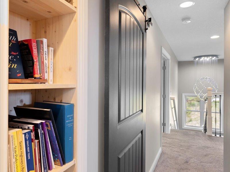 Fun Little Nook currently used for books with barndoor