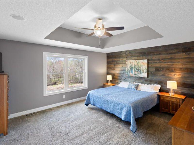 Spacious Primary Suite with tray ceiling
