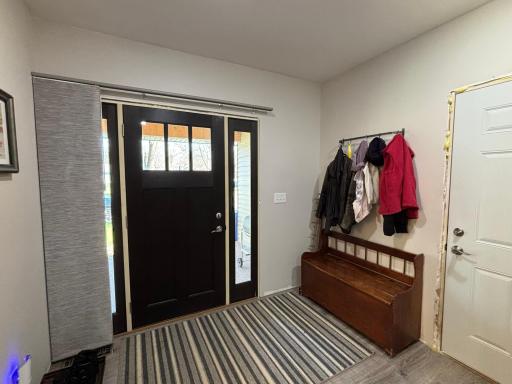 Front entry has a custom door with sidelights