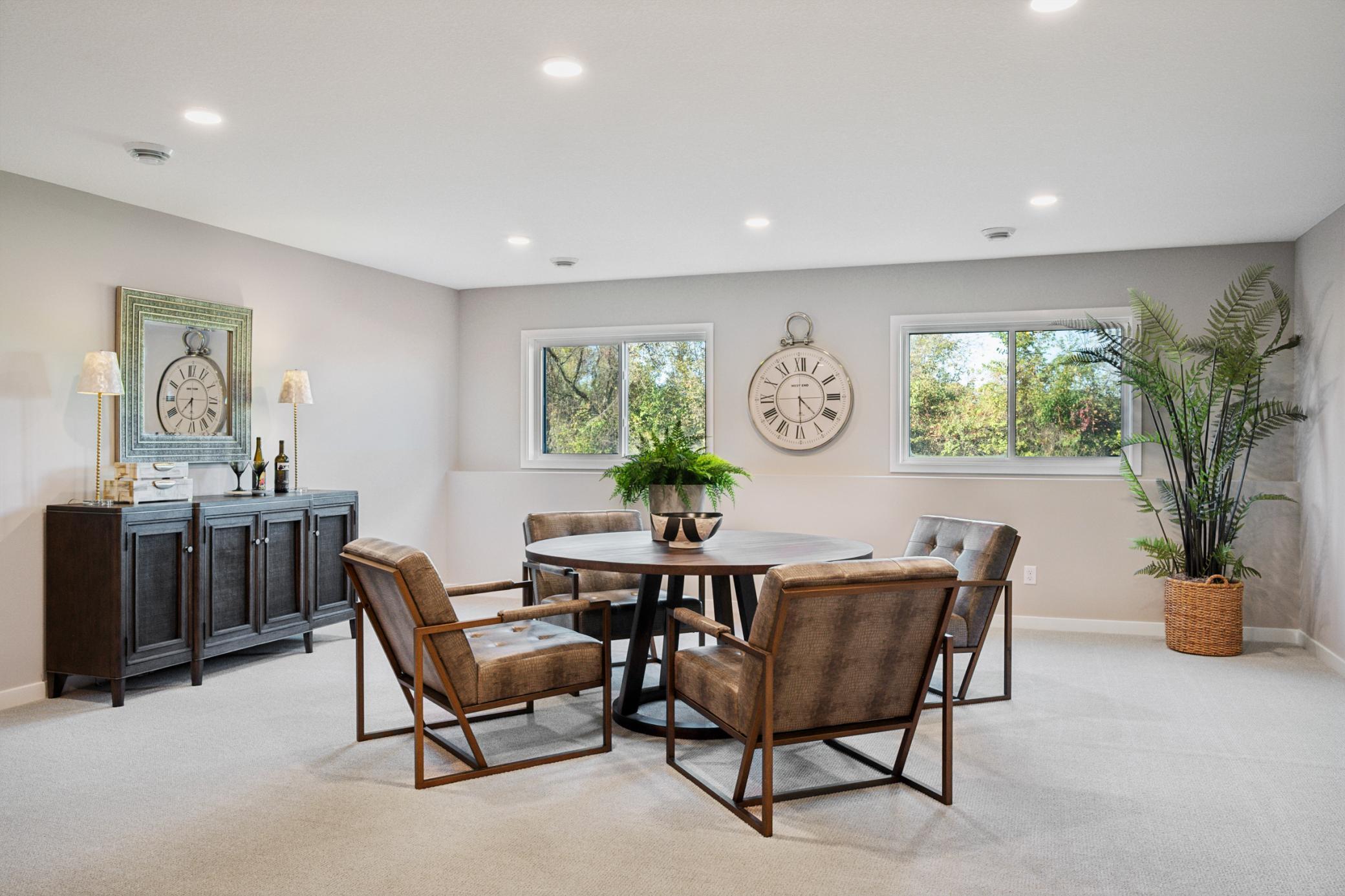 Spacious sun-filled finished Lower level with large mechanical room and additional large storage room! And 4th bedroom and another bathroom!