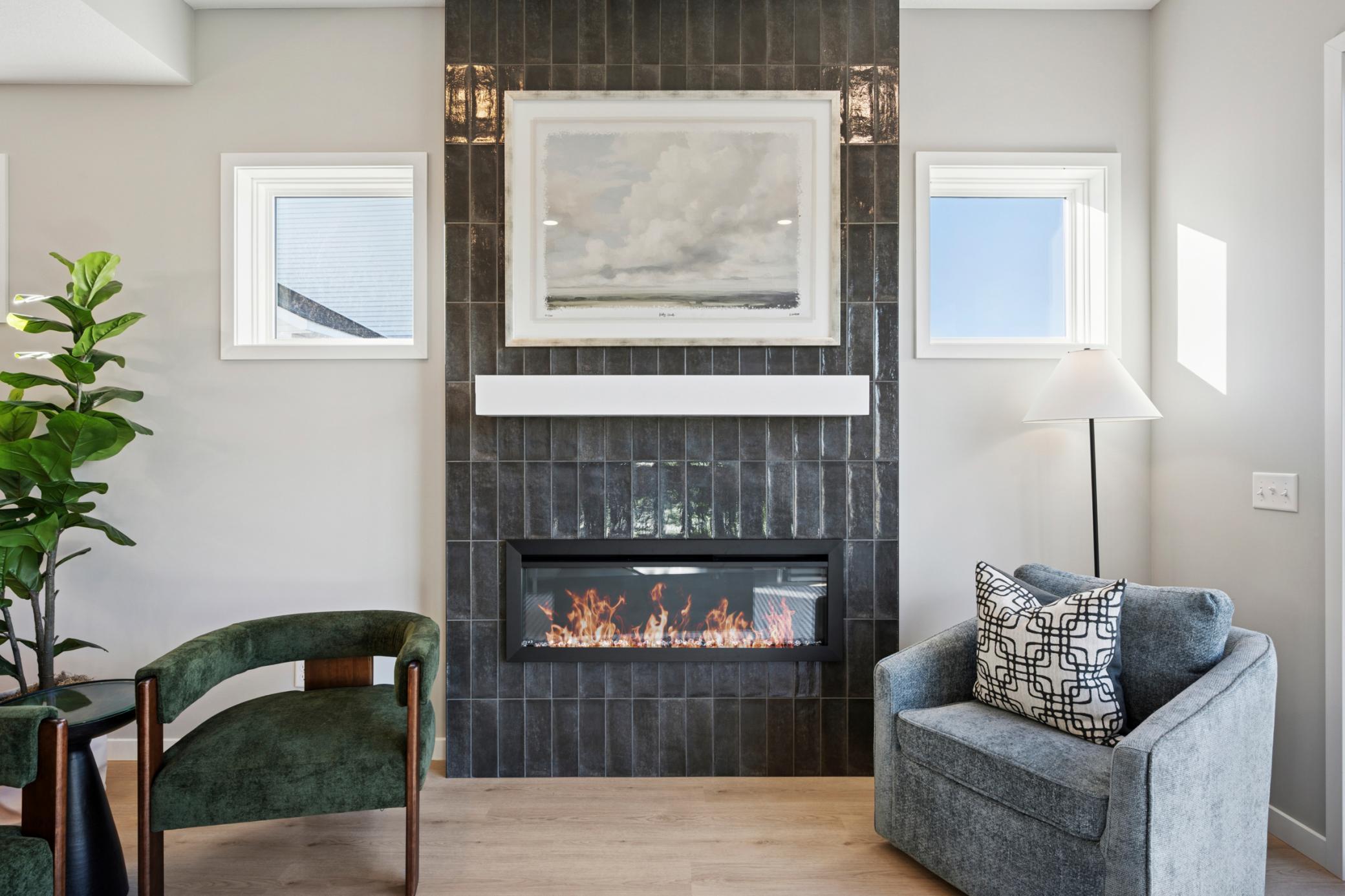 Gathering room features Tiled floor-to-ceiling fireplace!