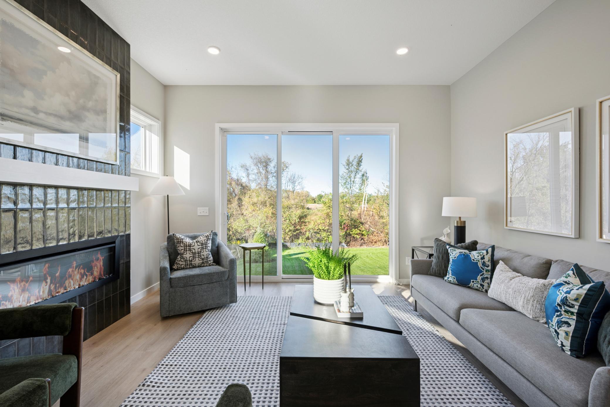 New Home! Our Model Home is now for sale! Gathering room features 10'H ceiling and 3-panel 8'H patio door! with Stunning backyard views!
