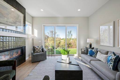 New Home! Our Model Home is now for sale! Gathering room features 10'H ceiling and 3-panel 8'H patio door! with Stunning backyard views!
