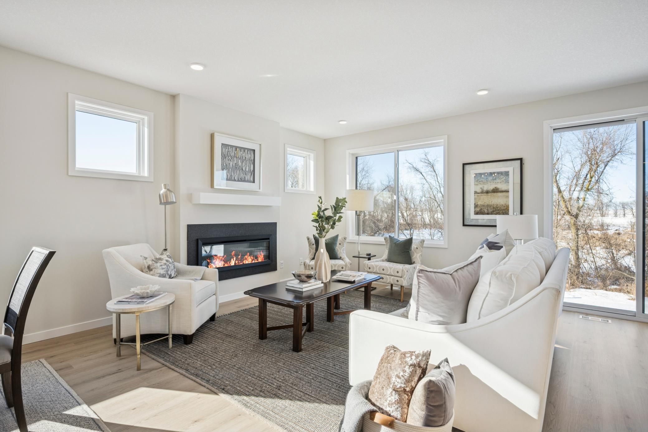 One-level living plus finished lower level! 2 bedrooms plus office on main floor! And Another bedroom and bath and large storage room at lower level! Amazing Backyard Views! Abundance of windows!